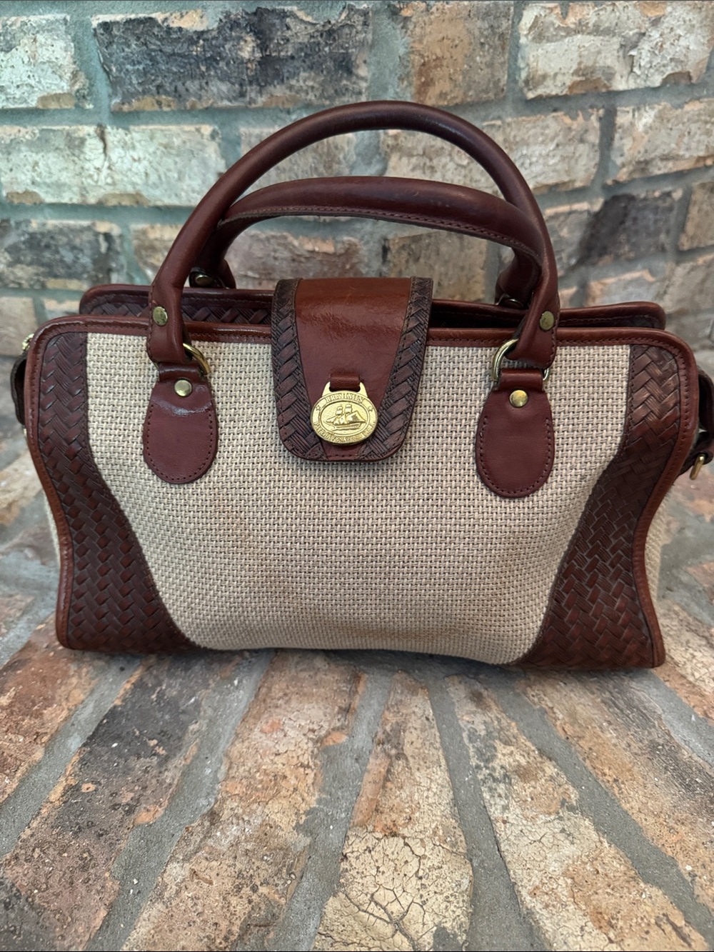 Brown Woven Leather Tote with Gold Medallion